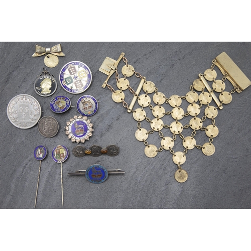 107 - A collection of silver and other coin brooches and other jewellery (13)