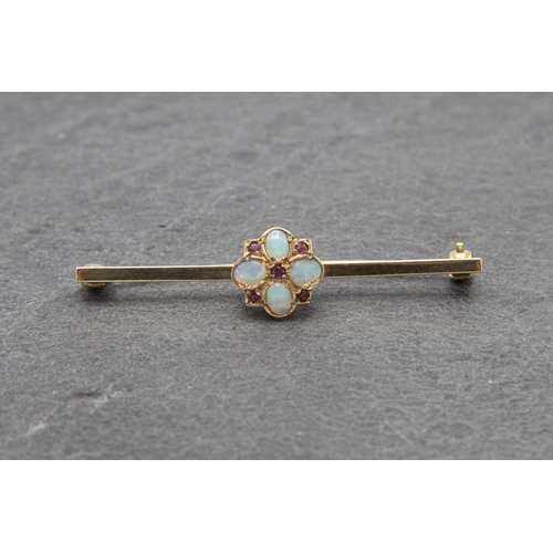 123 - 9ct opal and ruby sweetheart bar brooch, London 1997, 5cm long, 3.5g