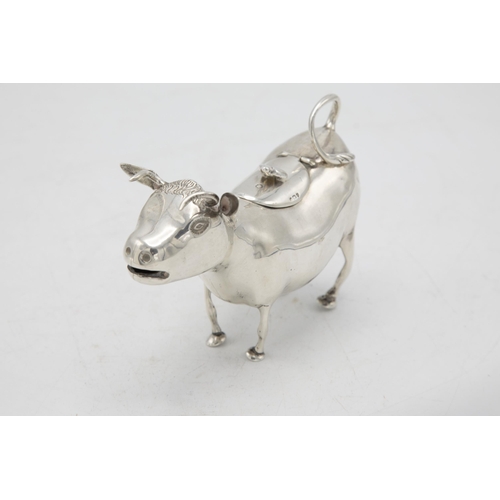 186 - Good quality Victorian import silver novelty Cow Creamer, with hinged top mounted by a bee, maker Sa... 