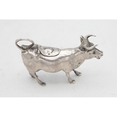 187 - Good quality Victorian import silver novelty Cow Creamer, with hinged top mounted by a bluebell, mak... 