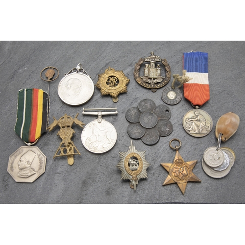 145 - Collection of Military medals and related items, to include 1947 Pakistan medal 1939-1945 medal and ... 