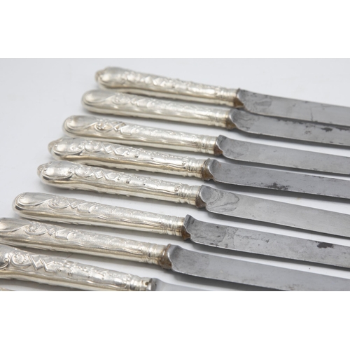 200 - Good quality set of eight Elizabethan Pattern silver cannon handled table and dessert knives, the ha... 