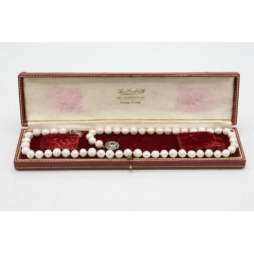 153 - Single strand of freshwater pearls retailed by Lane Crawford of Hong Kong, 58cm long