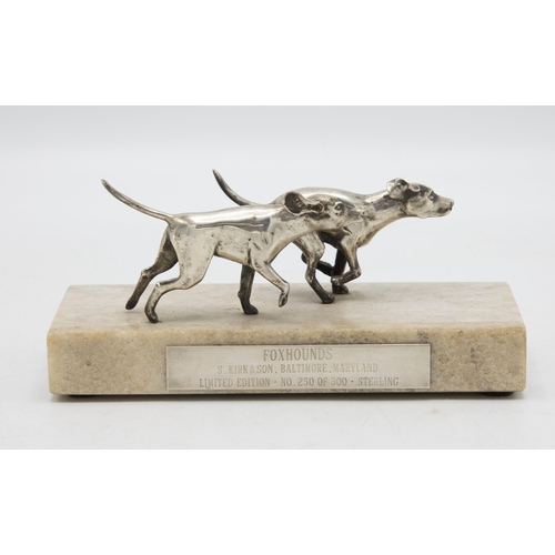 204 - Attractive silver sculpture or paperweight of two silver Foxhounds, on a marble base with plaque ins... 