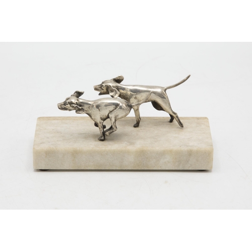 204 - Attractive silver sculpture or paperweight of two silver Foxhounds, on a marble base with plaque ins... 