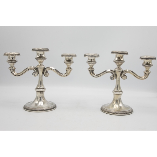 215 - Pair of continental 800 silver twin branch candelabra, 19 x 22cm, 28oz gross