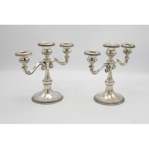 215 - Pair of continental 800 silver twin branch candelabra, 19 x 22cm, 28oz gross