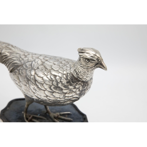 219 - Well observed Edwardian German Hanou silver pheasant model or decanter, with removable head, upon an... 