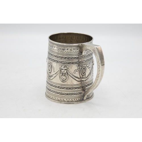 223 - Good quality George III silver mug, embossed with masks and swags, maker Peter and William Bateman?,... 