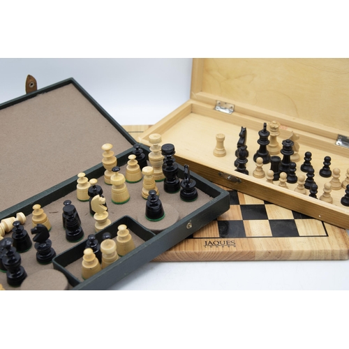 2451 - Chequered games board by Jaques of London, with chess set and further travel chess set