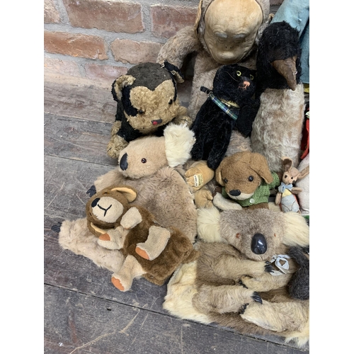 3650 - Large assortment of antique and vintage animal teddys to include panda, cat, fox and koala examples,... 