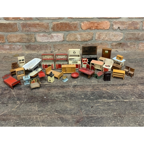 3656 - Assortment of vintage dollhouse furniture to include early enamel, tin plate and wooden pieces