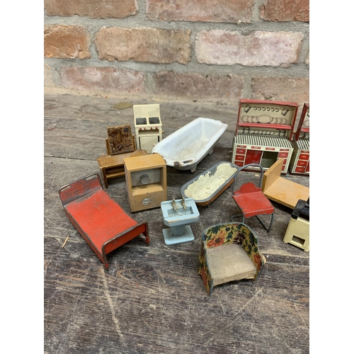 3656 - Assortment of vintage dollhouse furniture to include early enamel, tin plate and wooden pieces