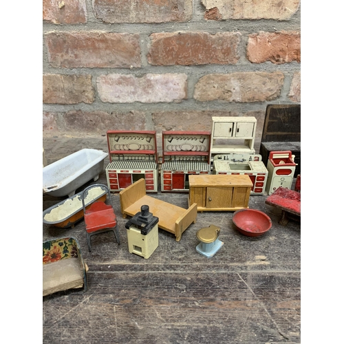 3656 - Assortment of vintage dollhouse furniture to include early enamel, tin plate and wooden pieces