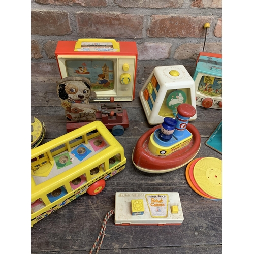 3657 - Quantity of vintage Fisher Price children's toys to include pull along musical examples and early mu... 