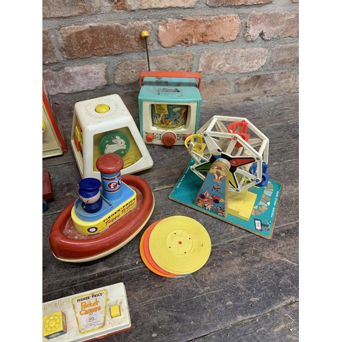 3657 - Quantity of vintage Fisher Price children's toys to include pull along musical examples and early mu... 