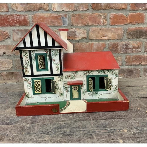 3660 - Vintage wooden Tudor style dolls house with red roof and cross hatched window design, includes furni... 