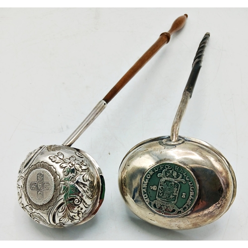 127 - Two Georgian silver toddy ladles, each fitted with a silver coin, one with horn handle, the longest ... 