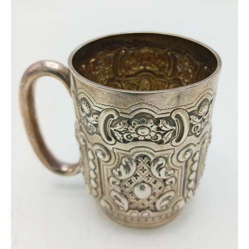 137 - Late Victorian silver christening cup or small tankard, embossed with Aesthetic Period panels, maker... 