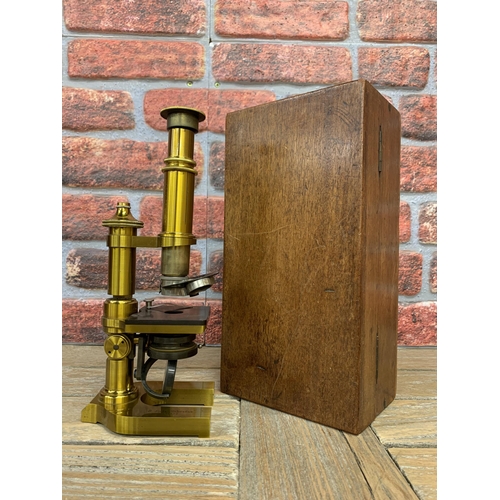 2302 - Antique Lietz Wetzlar brass scientific microscope with quantity of additional lenses, No. 16850, hel... 