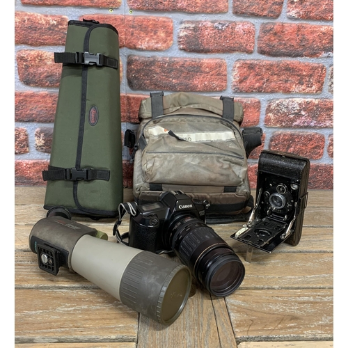 2305 - Quantity of photographic equipment to include Canon EOS camera, antique folding camera and Kowa TS-6... 