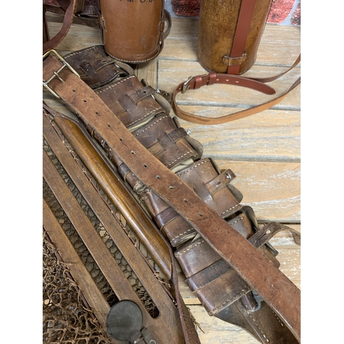 364 - Edwardian Leather gamekeepers items, to include ammunition belt, catch net, flask holder etc (6)