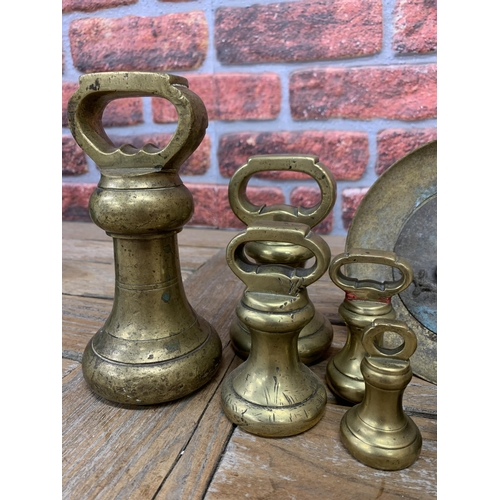 2213 - Collection of brass Avery scale weights ranging from 7lbs down to 4ozs (7). Together with a further ... 