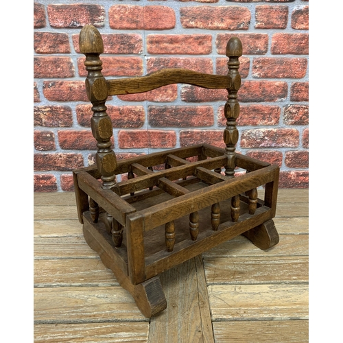 2176 - Provincial oak and beech six divisional bottle rack with raised gallery with turned pillars, 56cm x ... 