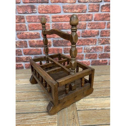 2176 - Provincial oak and beech six divisional bottle rack with raised gallery with turned pillars, 56cm x ... 