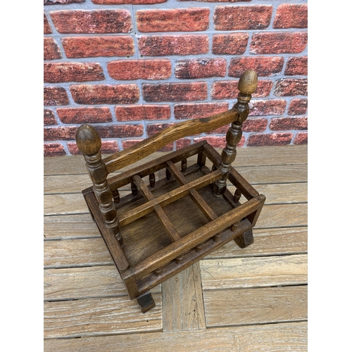 2176 - Provincial oak and beech six divisional bottle rack with raised gallery with turned pillars, 56cm x ... 