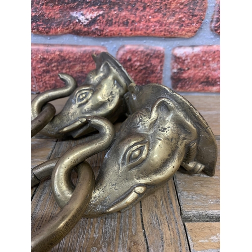 2226 - Pair of cast brass elephant head ring handles possibly for rope, 11cm deep (2)