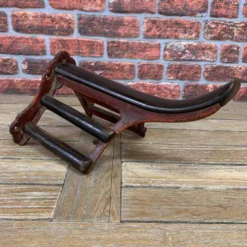 362 - Good quality 19th century cast iron and mahogany saddle rack, with red gesso painted finish, 47cm de... 