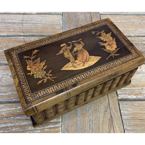 2179 - Sorrento souvenir puzzle box, the hinged lid inlaid with a dancing couple with bound book front and ... 