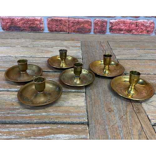 2239 - Pressed Brass 'Brighton buns' candle sticks, each opens to make a pair, campaign travel c1900 (3)