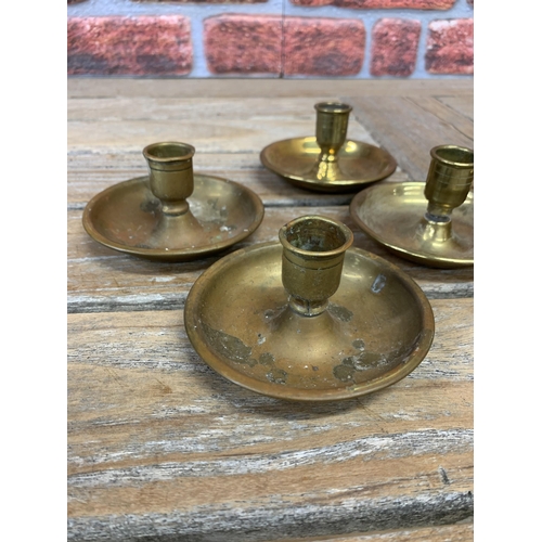 2239 - Pressed Brass 'Brighton buns' candle sticks, each opens to make a pair, campaign travel c1900 (3)