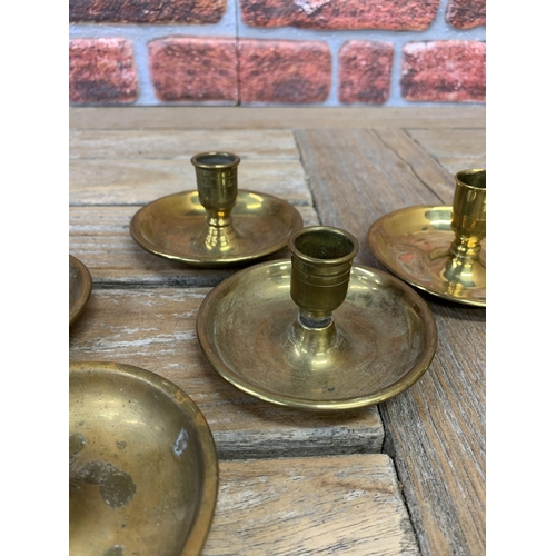 2239 - Pressed Brass 'Brighton buns' candle sticks, each opens to make a pair, campaign travel c1900 (3)