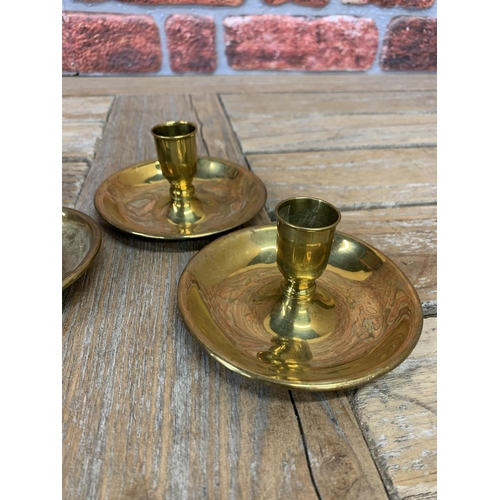 2239 - Pressed Brass 'Brighton buns' candle sticks, each opens to make a pair, campaign travel c1900 (3)