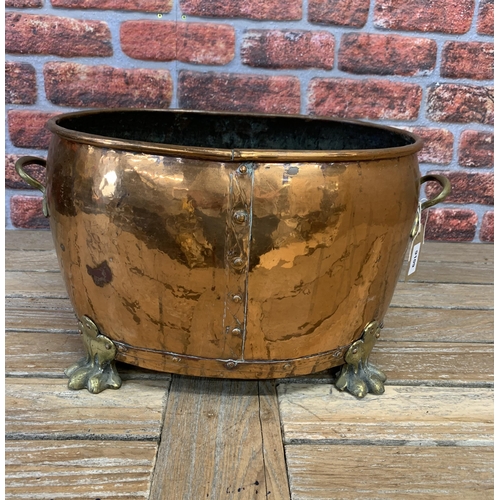 2248 - Antique large English polished copper Jardinière coal bucket on claw feet, W52cm x H29cm x D34cm