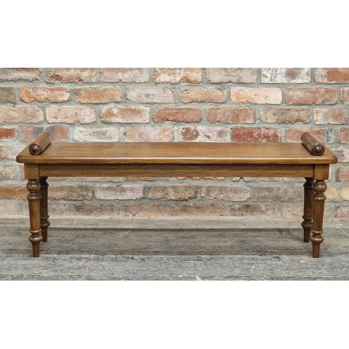 1318 - Victorian style oak window seat raised on turned supports, H 47cm x W 120cm x D 30cm