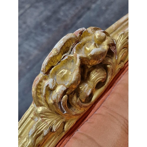 1338 - Antique French gilt wood sofa with coral button back upholstery and foliate decoration, raised on ca... 