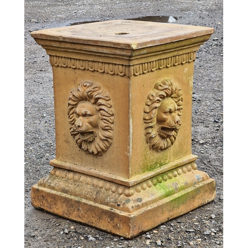 1058 - A good quality weathered terracotta plinth with lions mask decoration, H 55cm x W 42cm x D 42cm