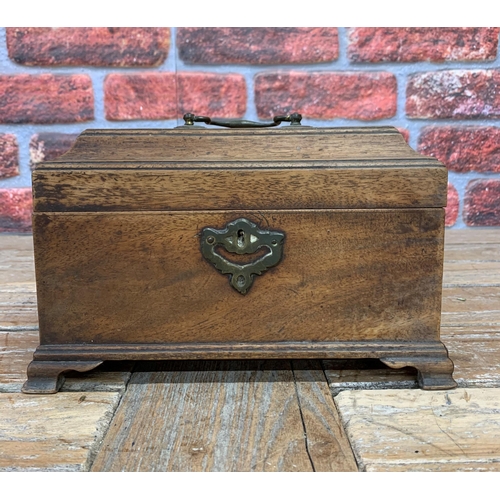 2187 - George III mahogany tea caddy, the Cavetto moulded lid lifts to reveal three compartments with origi... 