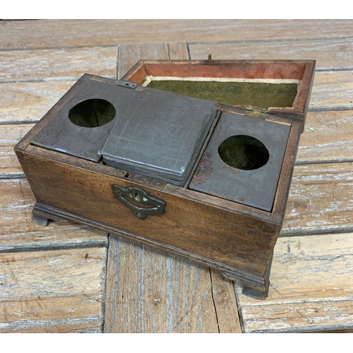 2187 - George III mahogany tea caddy, the Cavetto moulded lid lifts to reveal three compartments with origi... 