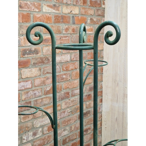 1028 - Vintage tall French wrought iron florists plant stand of scrolled form, H 161cm x W 80cm