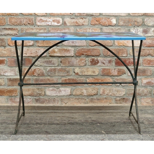 1030 - Vintage 20th century iron bistro table with colourful enamel top, H 68cm x W 88cm x D 64cm