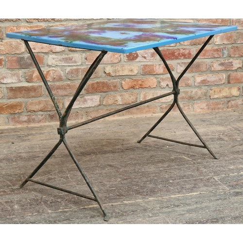 1030 - Vintage 20th century iron bistro table with colourful enamel top, H 68cm x W 88cm x D 64cm