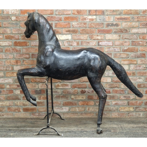 284 - Impressive 19th century French leather horse sculpture on iron trestle base, H 158cm x W 175cm