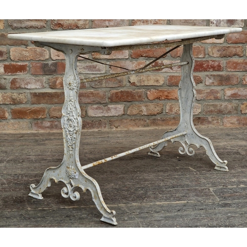 1032 - Early 20th century French painted iron bistro table with floral decoration and marble top, H 71cm x ... 