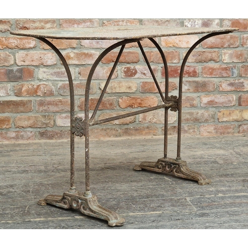 1033 - 19th century iron garden table with remnants of original paint, H 71cm x W 90cm x D 60cm