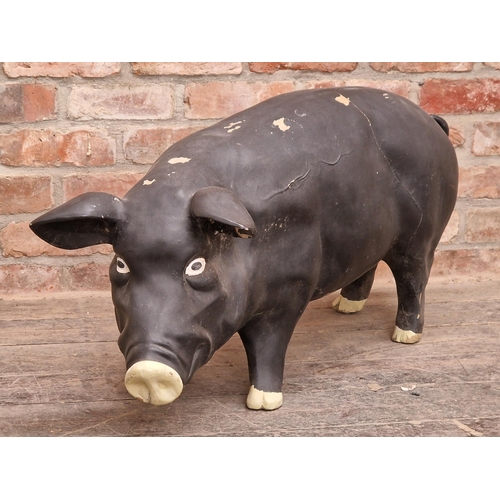 1035 - Contemporary painted resin pig, H 50cm x W 102cm (AF)